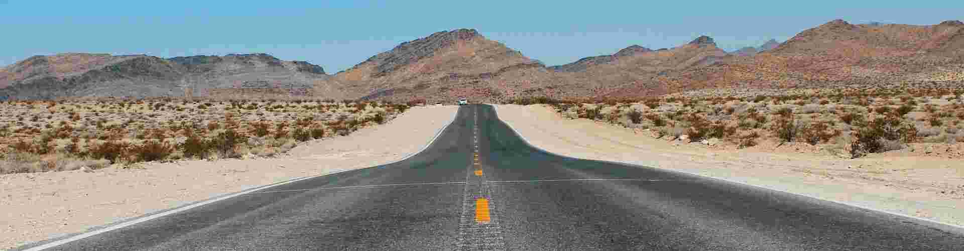 An empty road through Death Valley National Park in California