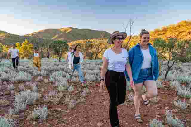 An Intrepid guide leading a group through the Flinders Ranges in South Australia