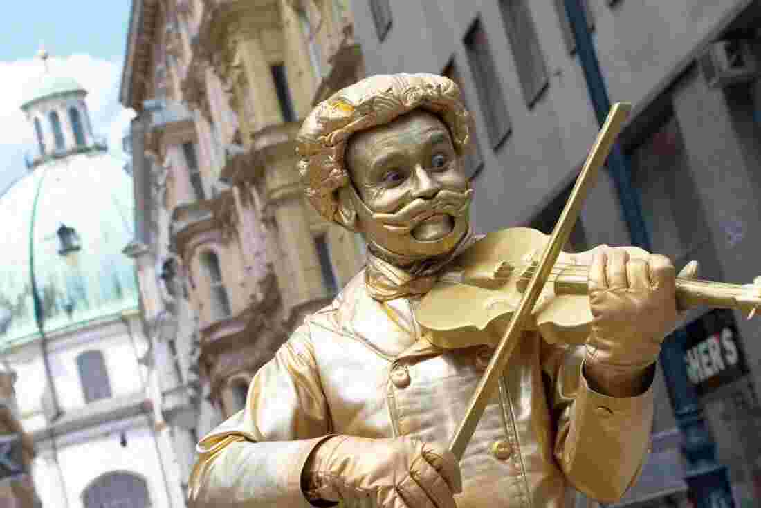 A gold-covered busker in Vienna, Austria