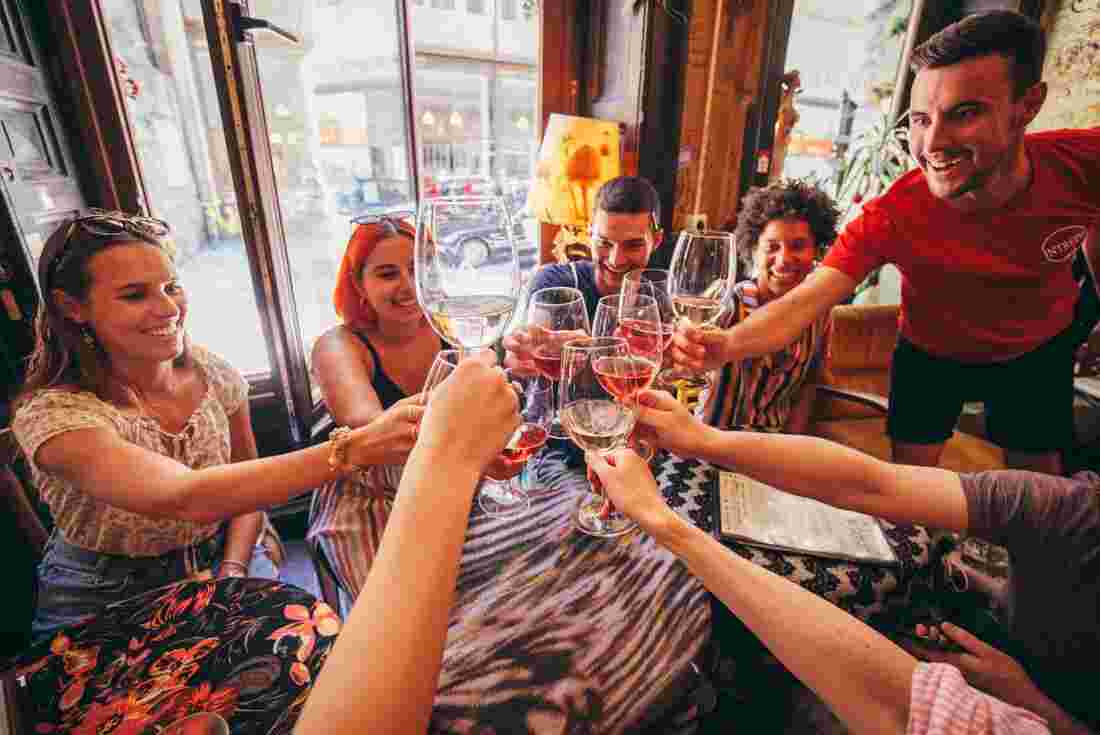 Group of travellers cheers drinks in Budapest