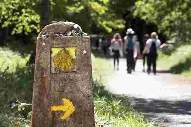 A stone sign signaling the start of the Camino de Santiago trek 