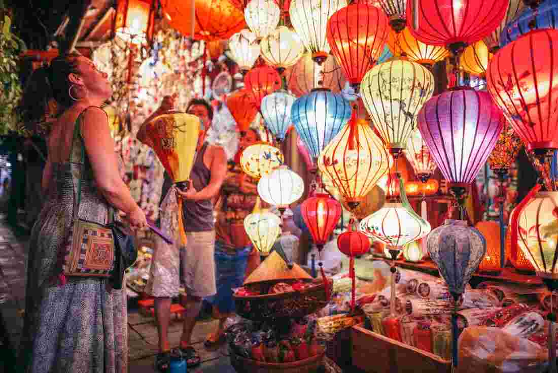 Traveller looking at lanterns in Hue
