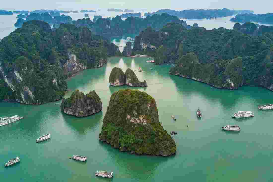 Ha Long Bay emerald waters and pillars