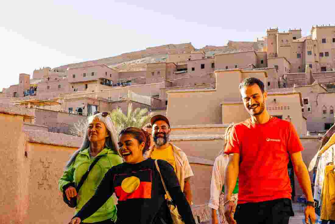 Group walking through Air Banhaddou, Morocco