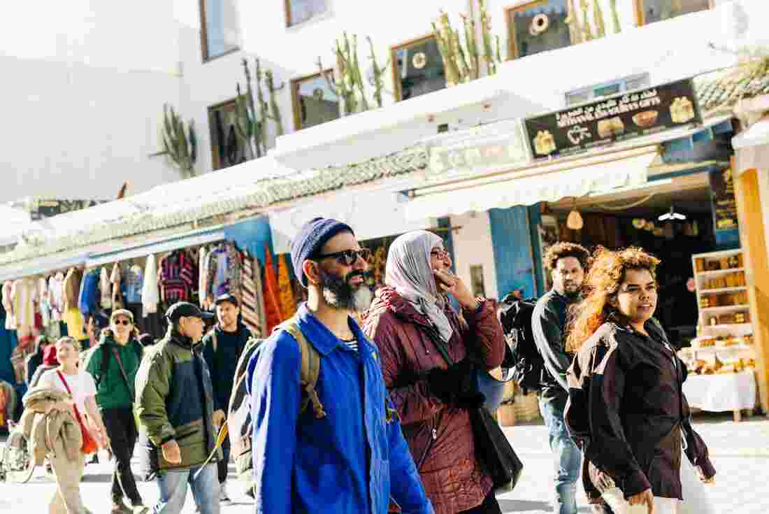Passengers walking through the market streets in Essaouira, Morocco