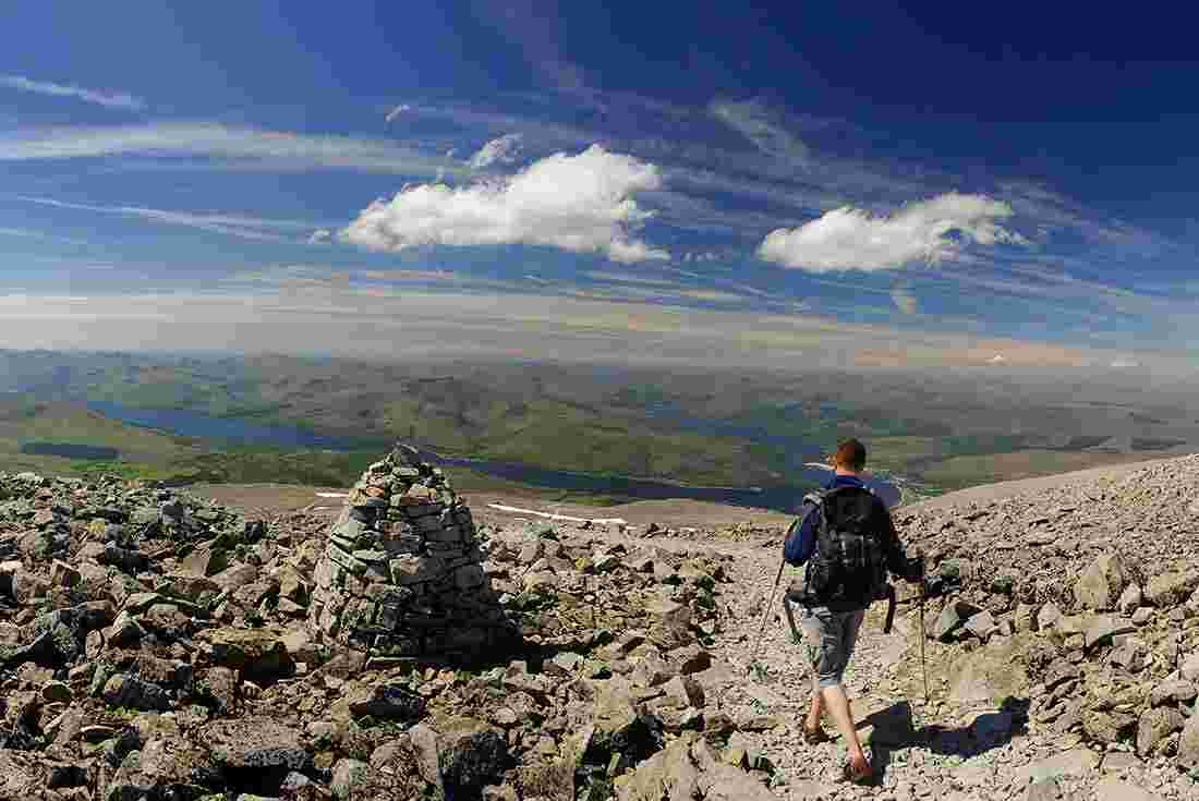 Hiker descending Ben Nevis, near Fort William, Scotland