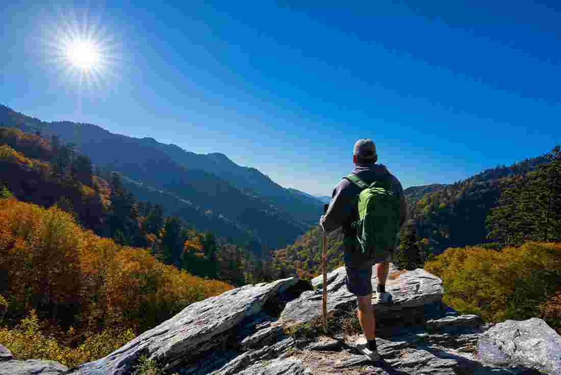 Hiker admiring view of Great Smoky Mountains National Park in Tennessee, U.S.A.