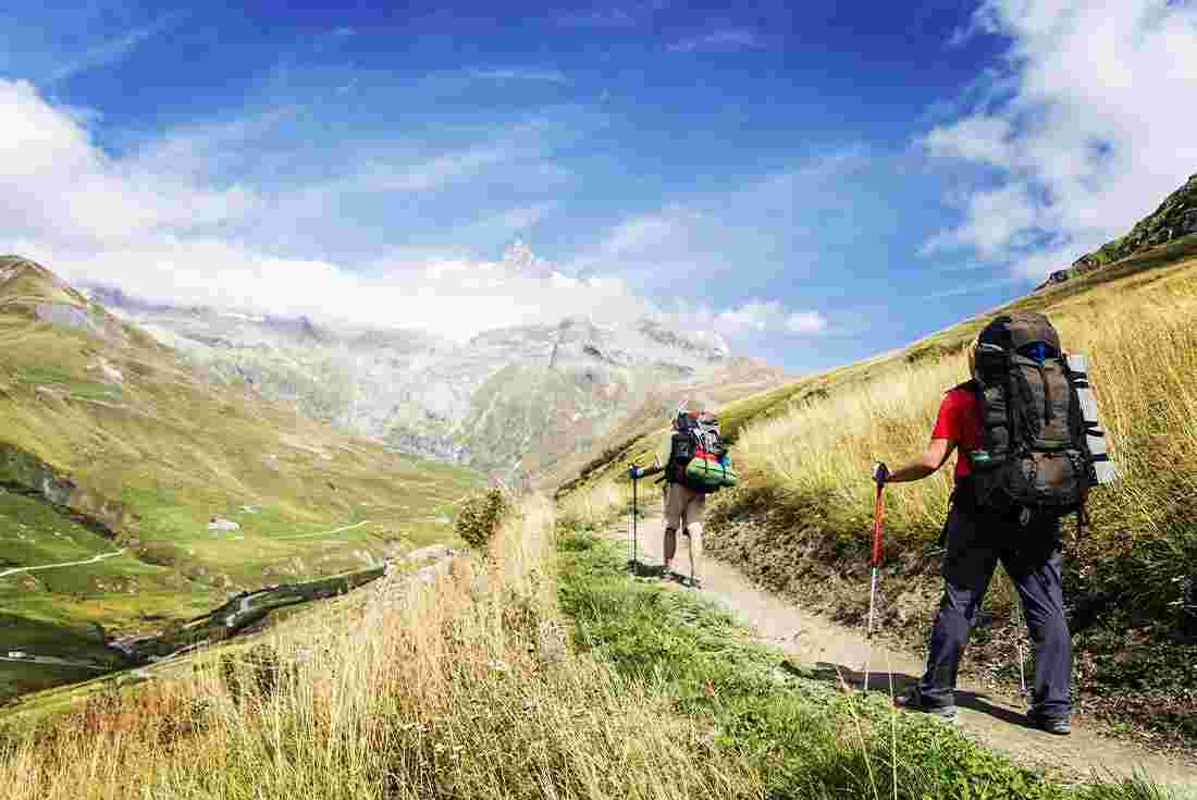 Hikers trekking the Tour du Mont Blanc trail