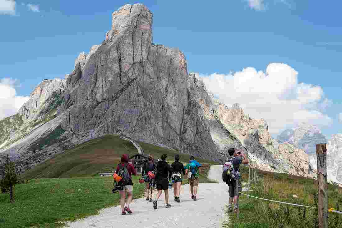 Group hiking in the Dolomites towards Tre Cime di Lavaredo