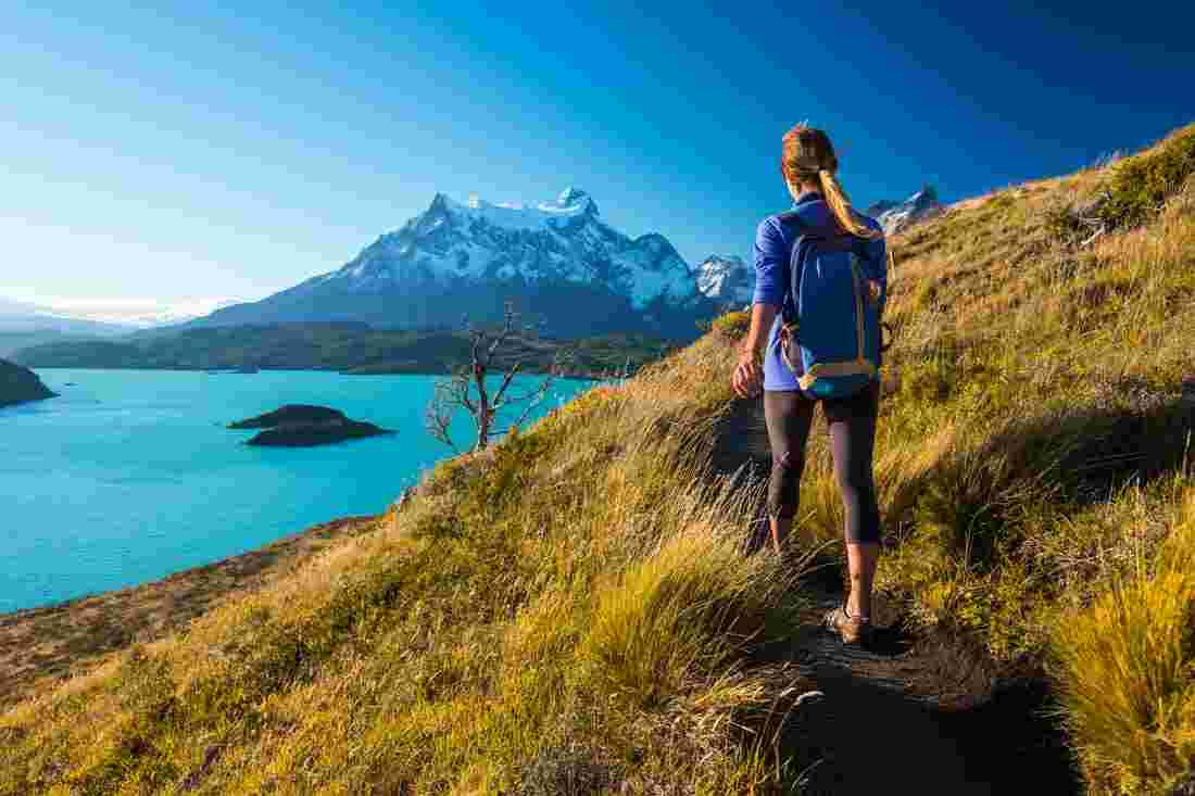 Woman hiking in Torres del Paine, Patagonia, Chile