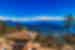 View looking out across Dochula Pass with memorial chortens in Bhutan mountains