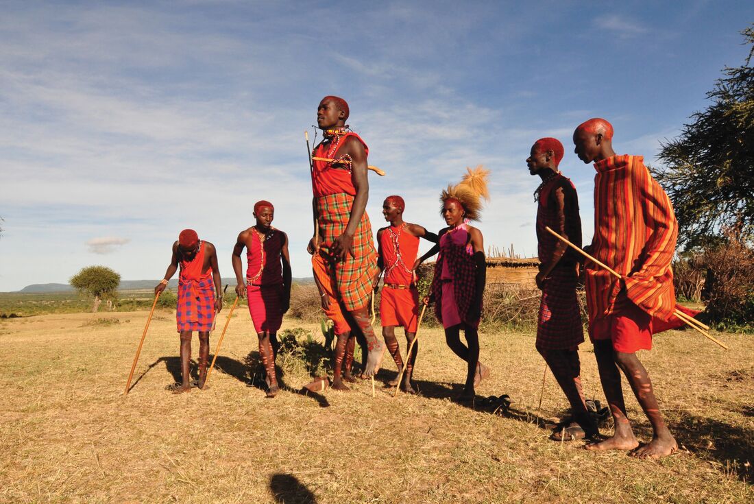 Masai tribe jump in red robes