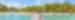 Tourist walking on jetty, Tikehau atoll, Tuamotu Archipelago, French Polynesia, Oceania