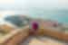Mother and daughter look out over Nafplio from a high stepped view on the Greek coast