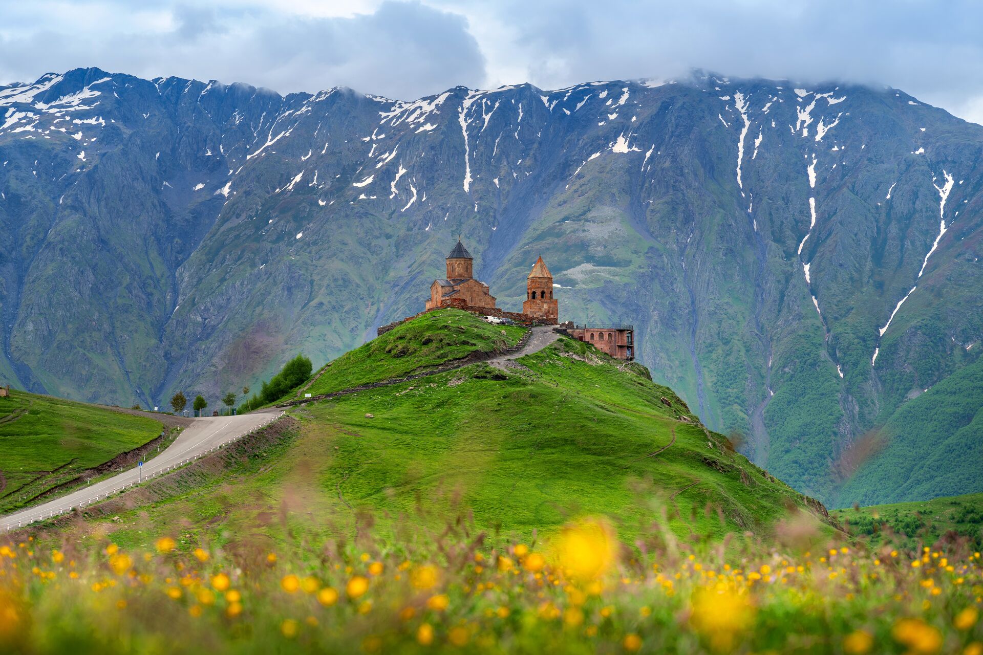 Gergeti Trinity Church in the midst of the Caucasus Mountains near the town of Stepansminda