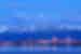 Anchorage Alaska skyline in winter at dusk with the Chugach mountains behind, USA