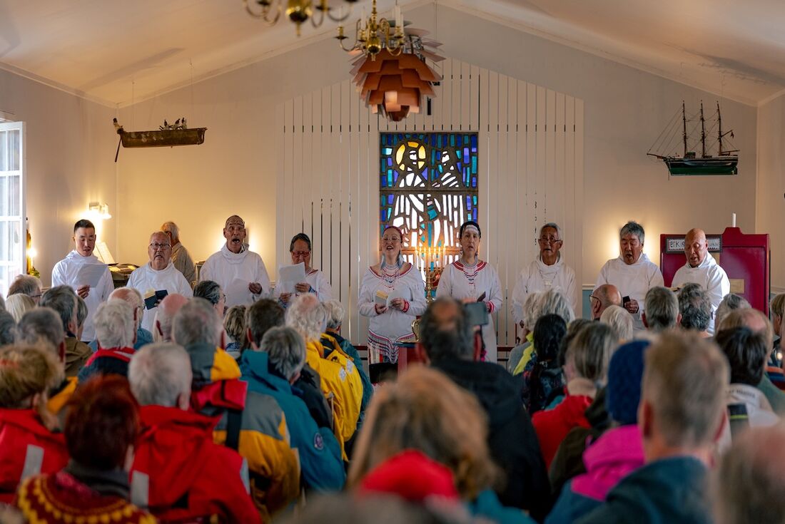 Share in a community music moment in Kuummiit