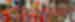 A colourful parade of people in traditional costume run South America