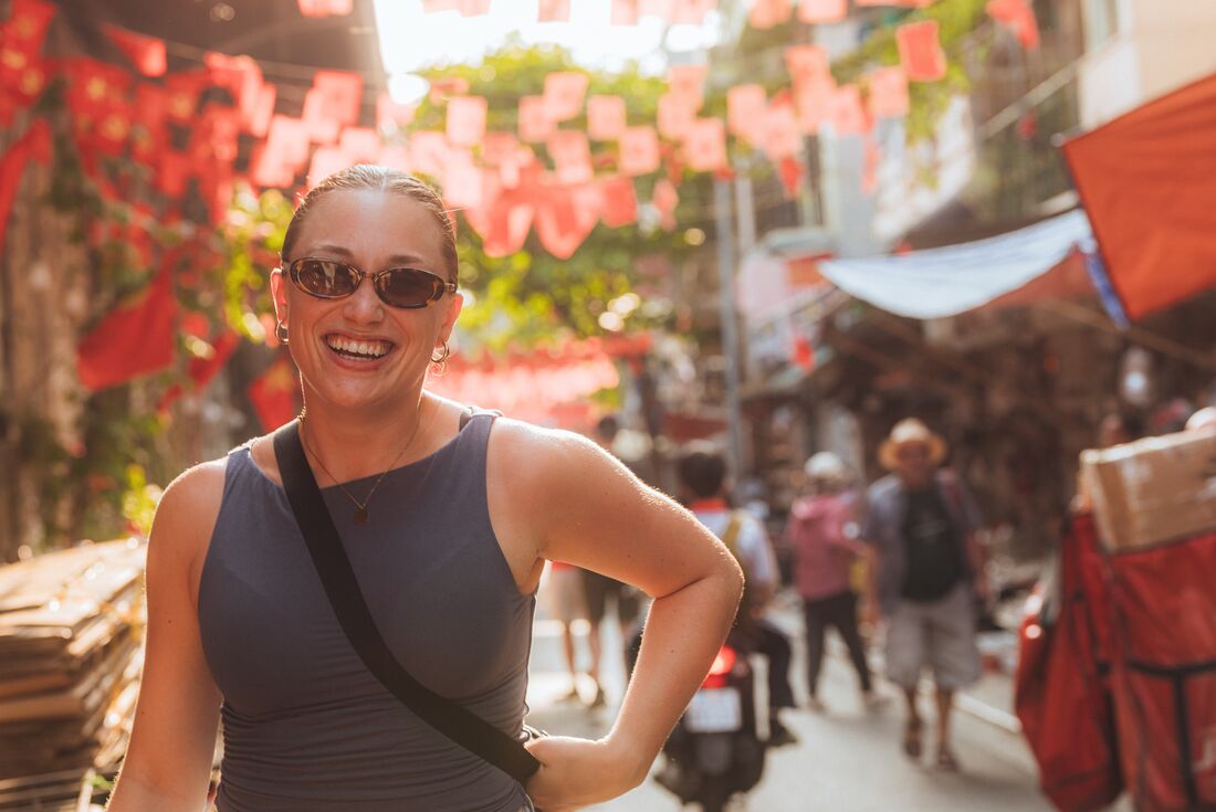 Smiling traveller on a walk in Hanoi, Vietnam