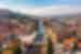 Looking at the township Sarajevo, Bosnia on a clear blue skied day, showing the river.