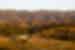 Aerial view of the woolshed accomodation facilities in vast, red landscape during sunset, South Australia