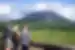 Travellers looking out over La Fortuna's Arenal Volcano