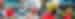 A woman smiles to camera from a Vespa with a driver while driving in Ho Chi Minh