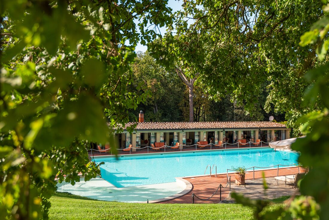 Relax poolside at the Borgo San Luigi in the Chianti region