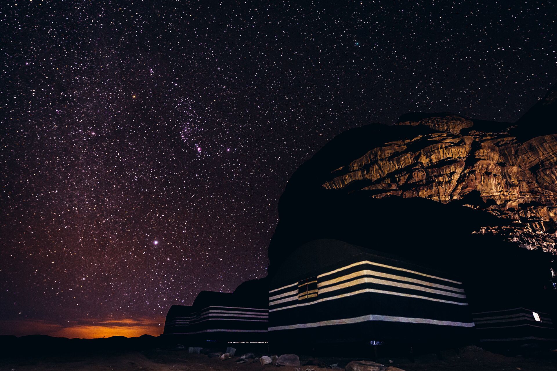 Step out at night to see the stars in the cool desert air of Wadi Rum
