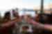 Intrepid travellers cheers in a seaside taverna in the Cyclades of Greece