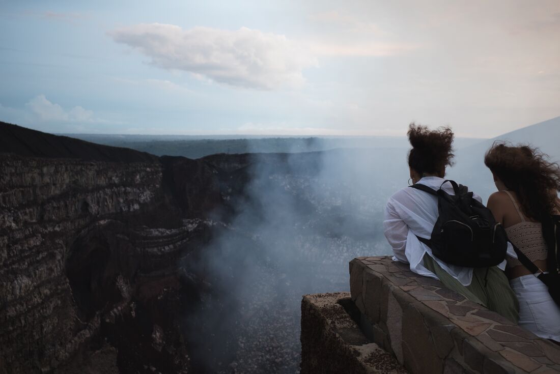 Travellers looking into Masaya Volcano in Nicaragua