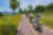 Travellers in more casual clothes cycle along the path of the 4 Rivers Cycling Track in South Korea