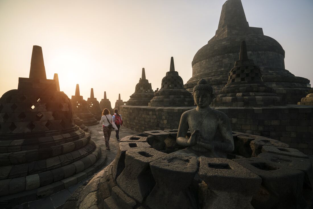 Exploring the majestic Borobudur temple at sunset