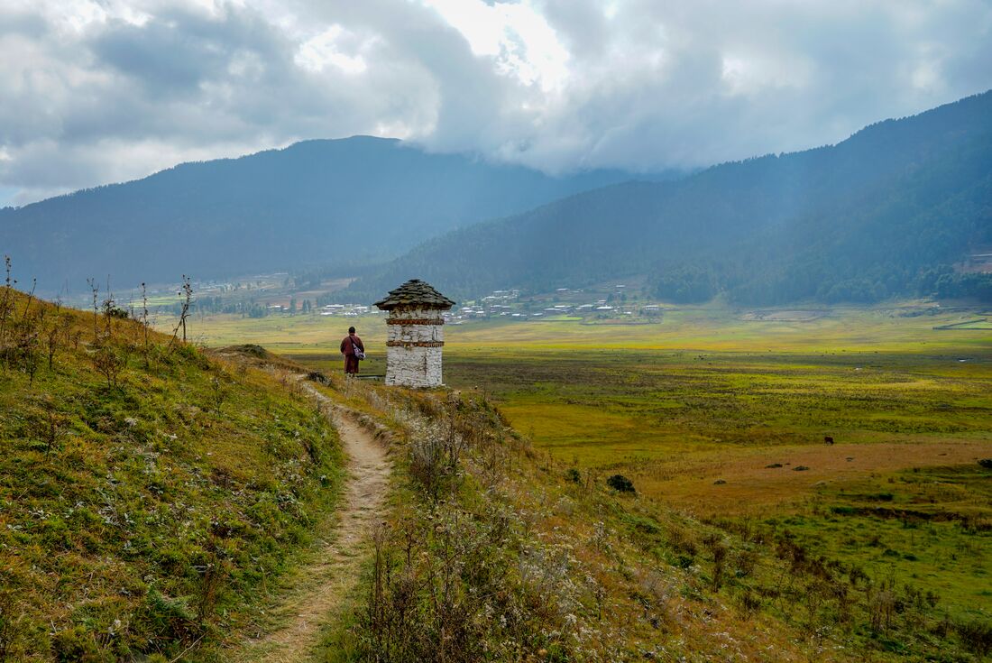 A local on the path in Tang Valley at the end of the Trans Bhutan journey