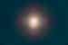 A total solar eclipse in progress as the sun begins to dissappear behind the moon