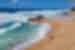 Drone shot of couple walking along Cape Vidal Beach, South Africa
