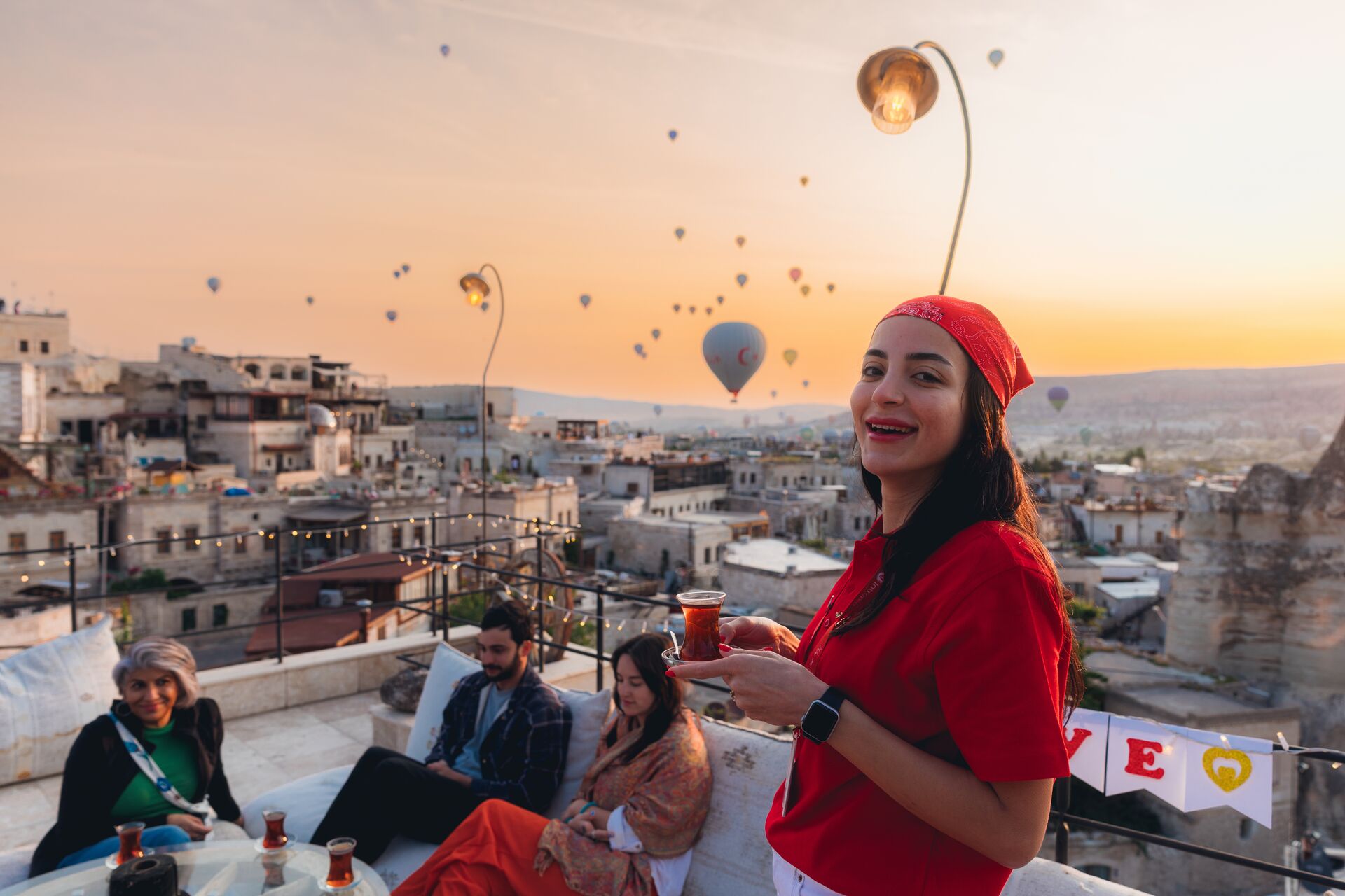 Take in the majesty of  hot air balloons ascending into the sky with Cappadocia's sunrise