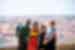 Group of Intrepid travellers laughing with city view in Lisbon, Portugal