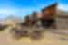 Wild west ghost town of Cody, Wyoming with abandoned wagons and shopfronts