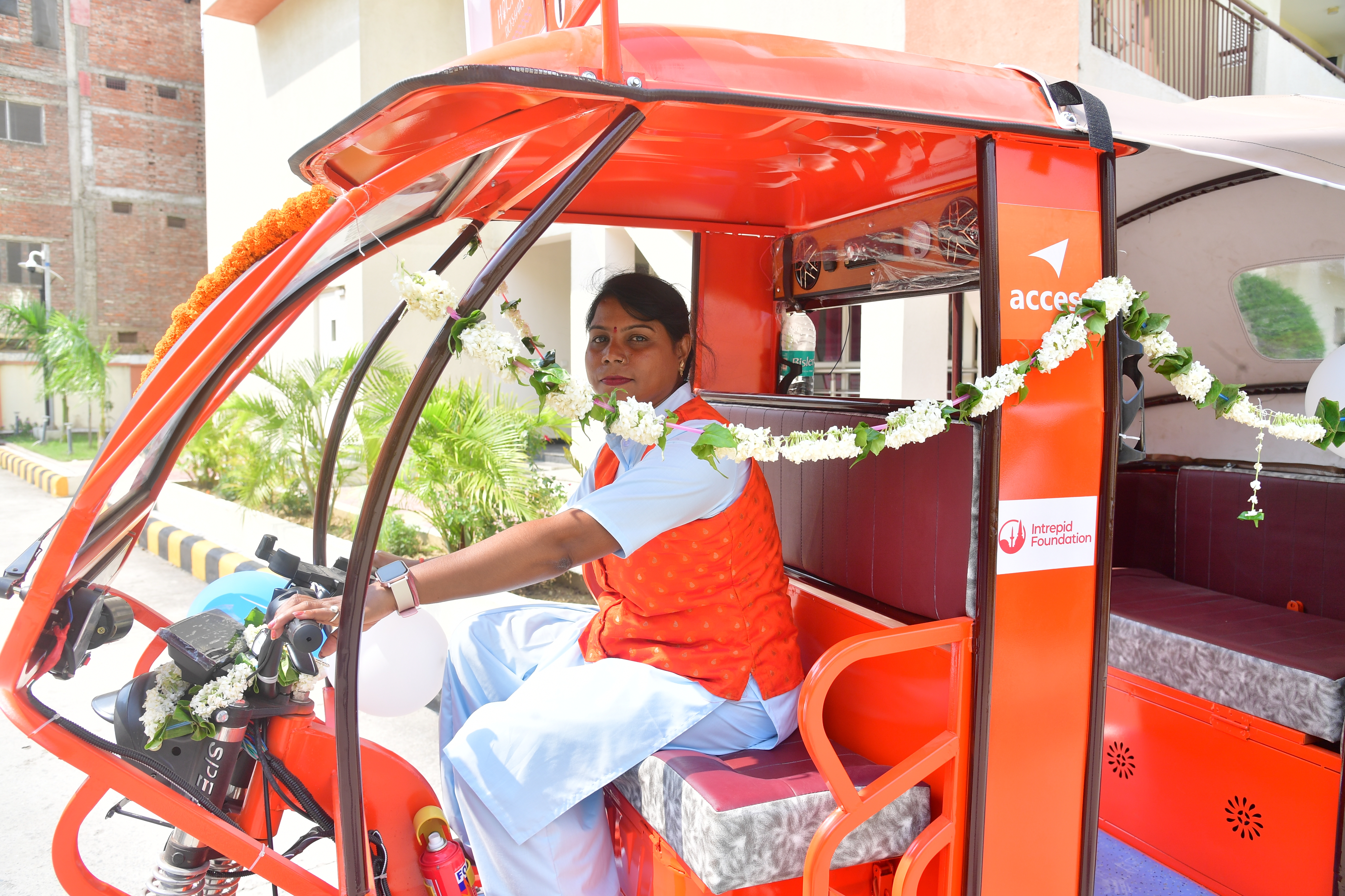 Woman driving a rickshaw