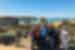 Group of travellers in front of the Twelve Apostles on Great Ocean Road