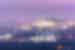 Aerial view of Faisal Mosque in Islamabad with purple sky
