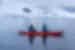 Two Intrepid travellers kayaking in Antarrctica