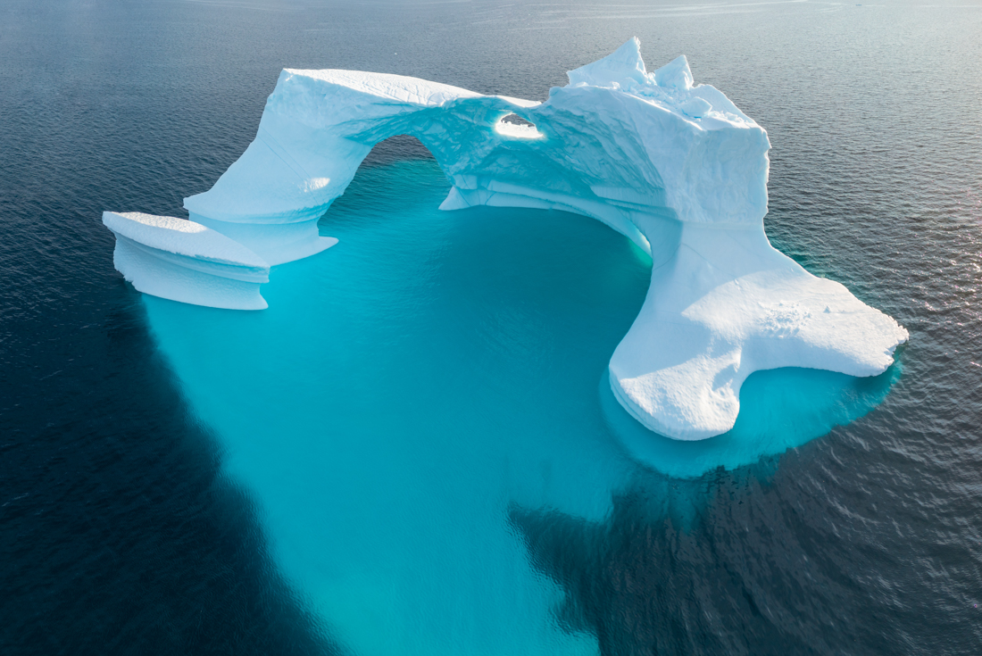 An artfully melted iceberg in the Ilulissat Icefjord of Greenland