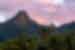 Sunset over Rarotonga jungle covered mountain in the Cook islands in the south Pacific