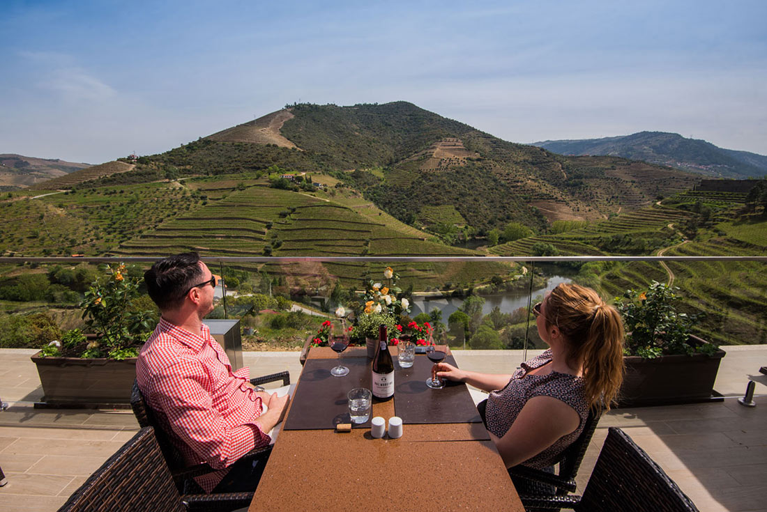 Portugal Feature Stay: Villa Gale Douro Vineyards people enjoying wine on rooftop