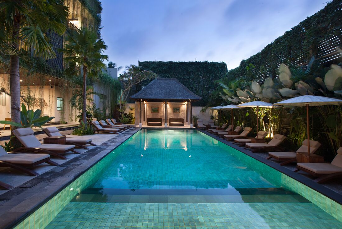 Relax by the poolside at the Ubud Village Hotel