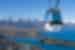 Skyline gondola in front of Queenstown landscape of vast mountains in the background, New Zealand
