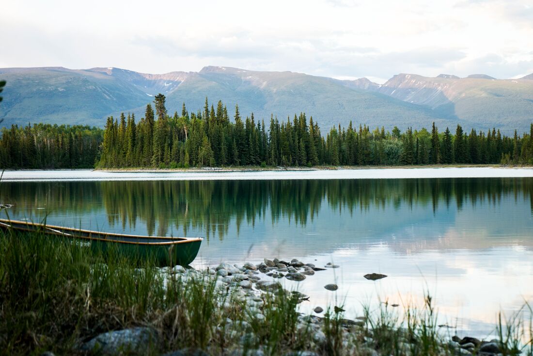 Canoe on the shore by Boya Lake, Alaska