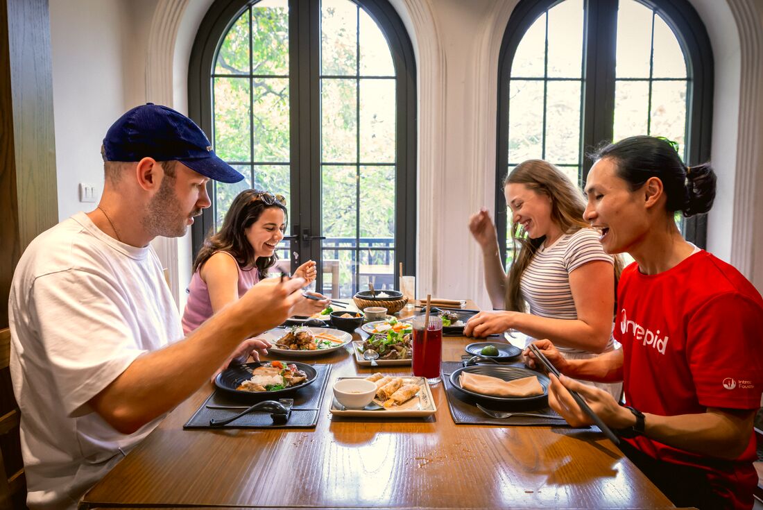 Sharing a meal at the social enterprise KOTO restaurant in Hanoi, Vietnam